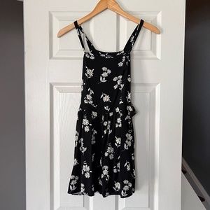 2/$30 SALE. Art Class Black Daisy Print Romper Size XL (14/16)